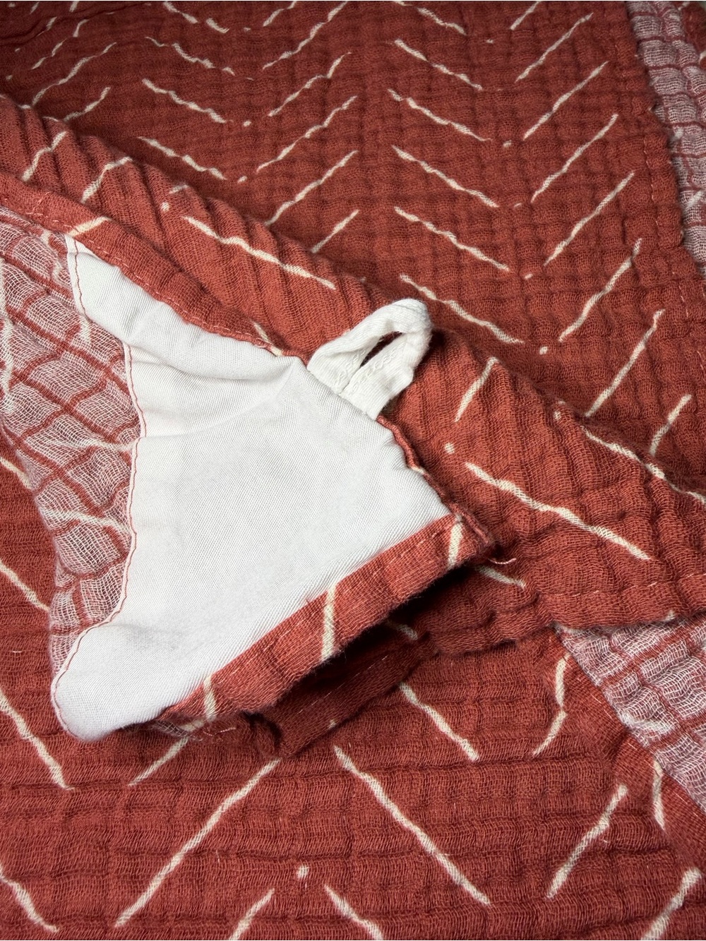 Itzy Ritzy Rust Red Chevron Muslin Swaddle - Picture 4 of 4